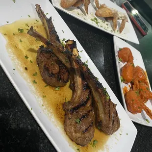 Lamb chops, buffalo shrimp and lemon pepper wings