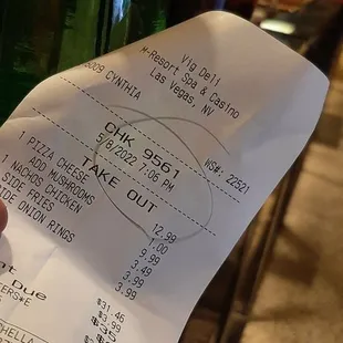 Free 99...  I love this place..  14" Cheese Pizza Special with mushrooms  Chicken nachos  Onion rings Friesl