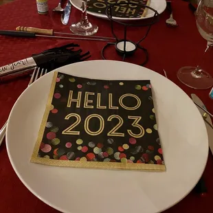 a place setting for a new year's eve party