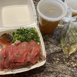 P14 Pho with Eye Round Steak and Fatty Brisket (takeout)