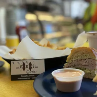 Turkey pesto on croissant, fries, chocolate malt.