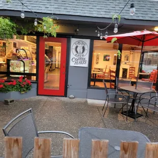 patio area with tables and chairs