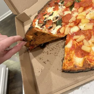 Gluten free cauliflower pizza - delicious! It is floppy but the taste is amazing. Can't believe this is cauliflower pizza!