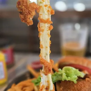 Jalapeno cheese stick, part of the Viking burger. Cheese pull game on point.