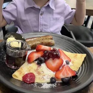 Small Swedish pancake with sausage