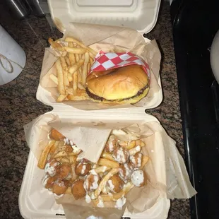 Cheeseburger with ketchup and chicken bites with garlic Parmesan and Cajun rub