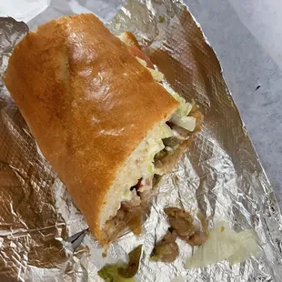 Half eaten Teriyaki Chicken sandwich