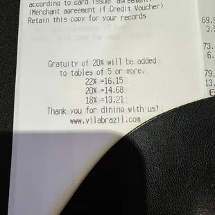 Asking for an extra tip percentage on an auto gratuity included check.