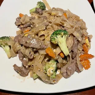 Pad Se Ew noodles with beef - $15.99 - generous portion size - delicious! Plenty for entree-sharing
