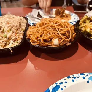 three plates of food on a table