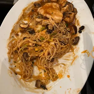 a plate of pasta and mushrooms