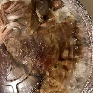 a plate of meat and rice