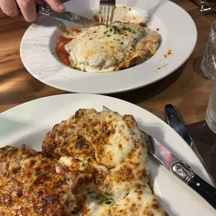 Note the doneness of the mozzarella on the chicken vs my hubbys veal parm