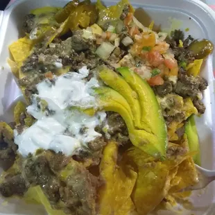 OMG beef and steak nachos with the works!! A must try