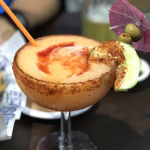 a cocktail with a garnish garnish garnish garnish garnish garnish ga