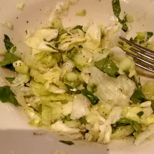 My salad sans carrots, with iceberg, a little spinach and diced cucumber -- tacky