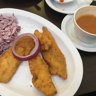 a plate of food and a cup of coffee