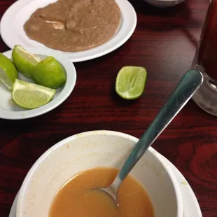 a bowl of soup with a spoon