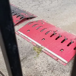 Exit gate with spikes that slashed our tire
