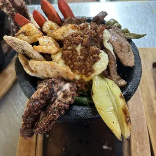 a bowl of seafood and vegetables