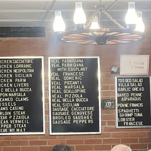 Menu on wall but no prices