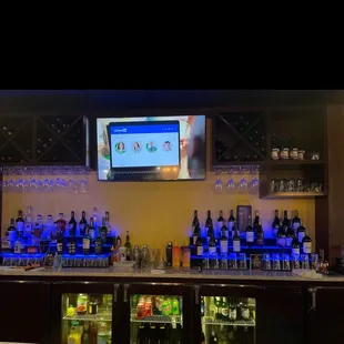 a bar with liquor bottles