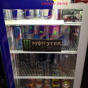 a refrigerator full of energy drinks