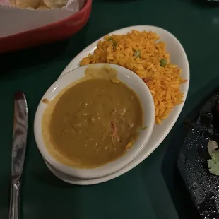 Side beans and rice with the fajitas.