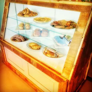 The Case! It has a new look with reclaimed 180 year old flooring to create this beauty! Made by local carpenter and neighbor, Erik!