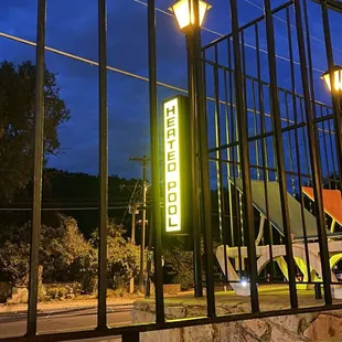 "Heated Pool" sign just outside the pool area.