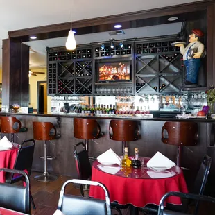 a restaurant with red tablecloths and red tablecloths