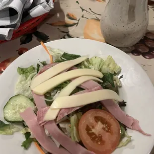 Side antipasto upgrade for $3 with house made Italian. Great salad.