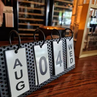 a row of luggage tags on a table