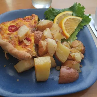 Quiche lorraine with a side of potatoes