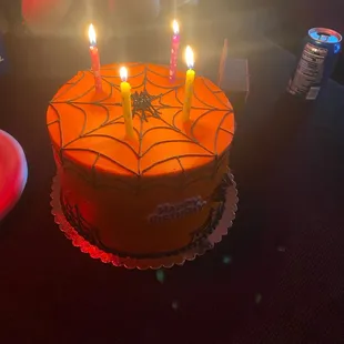 a birthday cake with candles