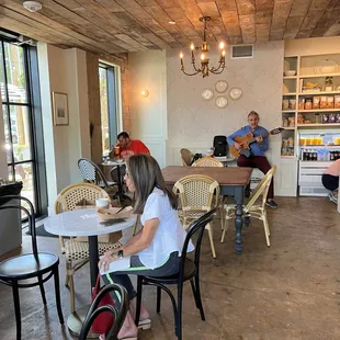 a group of people in a kitchen