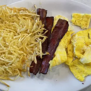 Eggs, outstanding hash and bacon