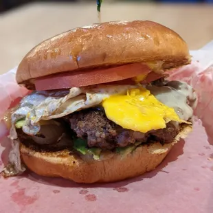 House burger with egg add-on.