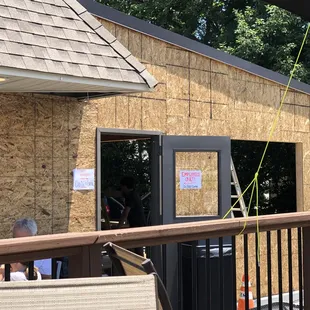 Enclosing one of the outdoor patios.  (Pic taken 6 weeks ago.)