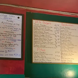 a menu and price list on the wall
