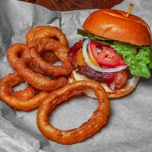 Our bacon cheddar burger with onion rings!