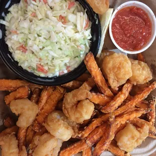 Fried shrimp platter with NC sweet potato fries and crispy slaw.