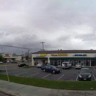 a parking lot with cars parked in it