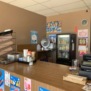a counter with a vending machine