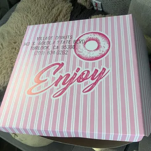 I&apos;m smitten with the pink &amp; white Candy Stripper theme on their donut boxes. xoxo