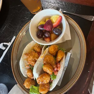 Boom boom shrimp tacos with fresh fruit side