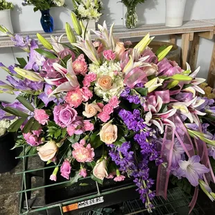 Finishing up a casket spray for a loved one.