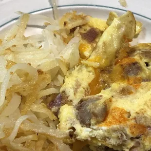 Meat lovers omelet and hash browns