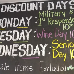 a blackboard with a list of discount days