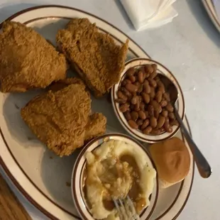 Fried chicken mash potatoes pintos